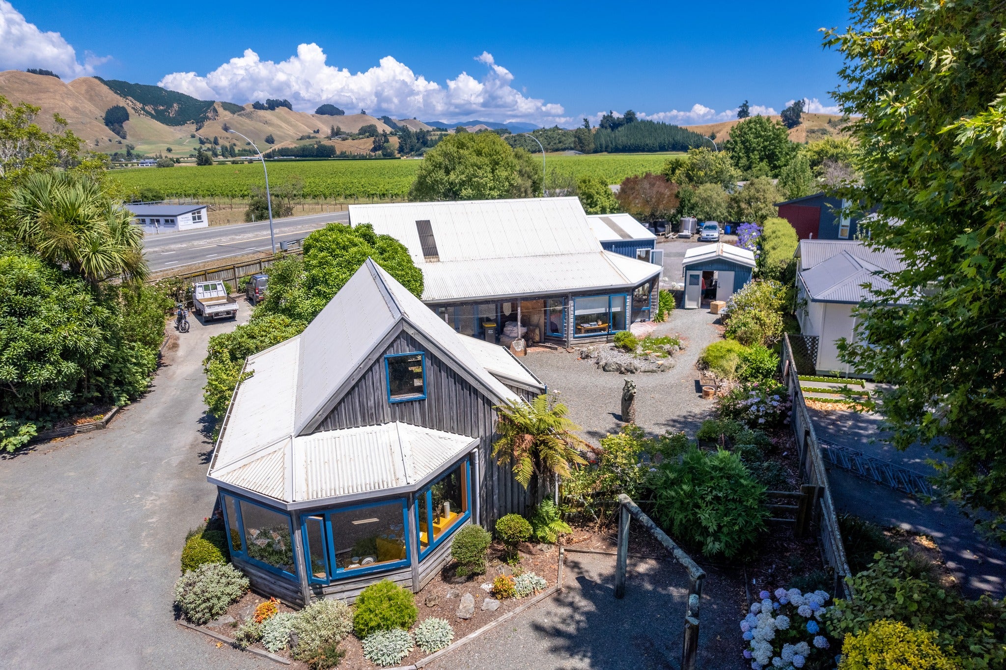 Overhead photo of McGlashen Pottery on-site gallery and workshops in Nelson, New Zealand